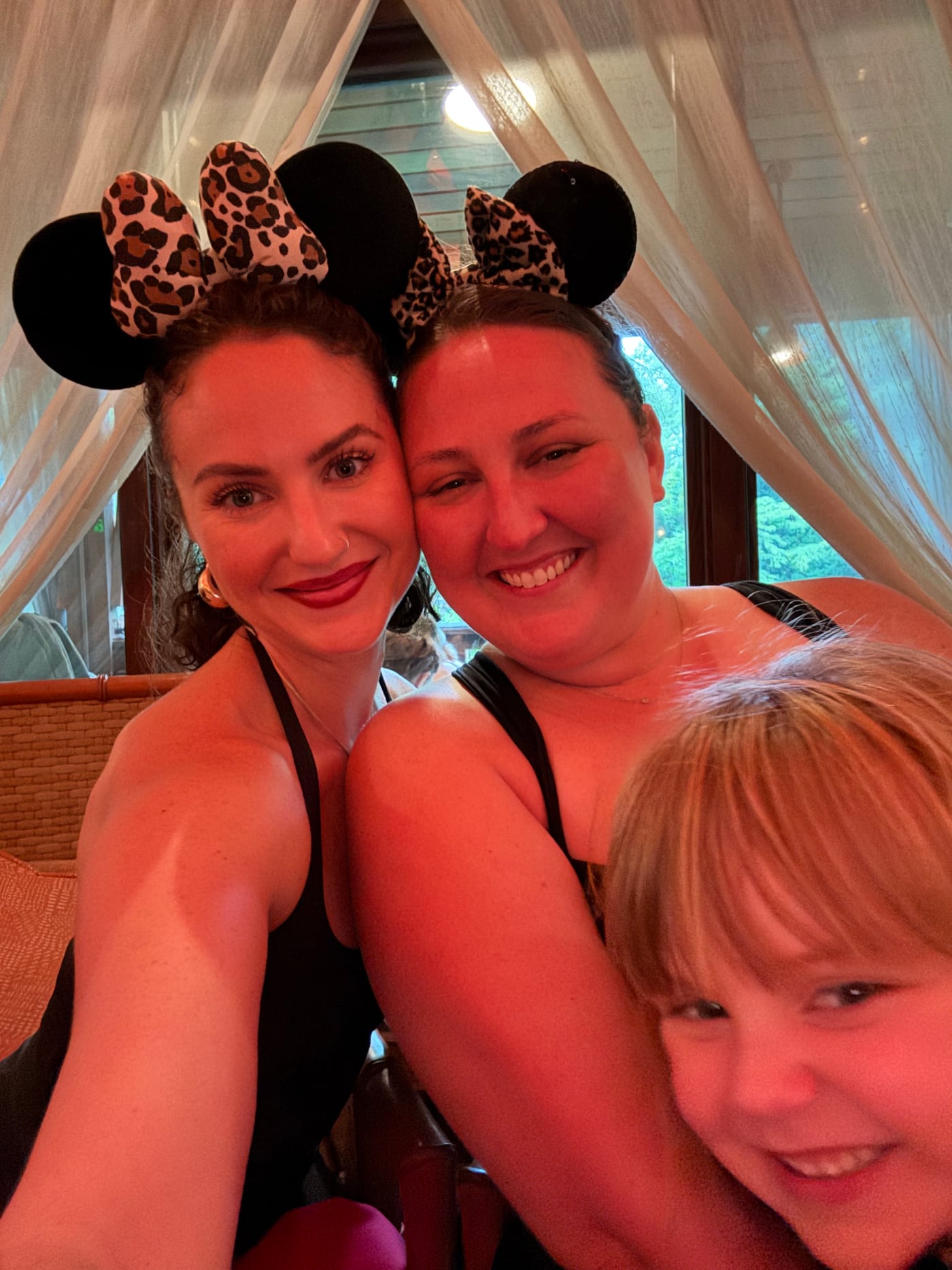 Katie, Cristina and Quinn at Disney in matching leopard Minnie ears
